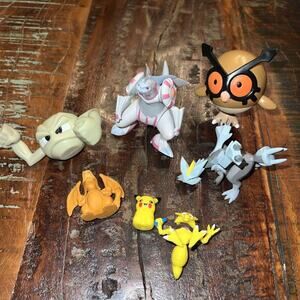 Lot Of 7 Pokémon Figures Pikachu Charzard Hoothoot Geodude Palkia Kyurem VTG